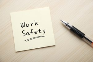 Work safety written on sticky note
